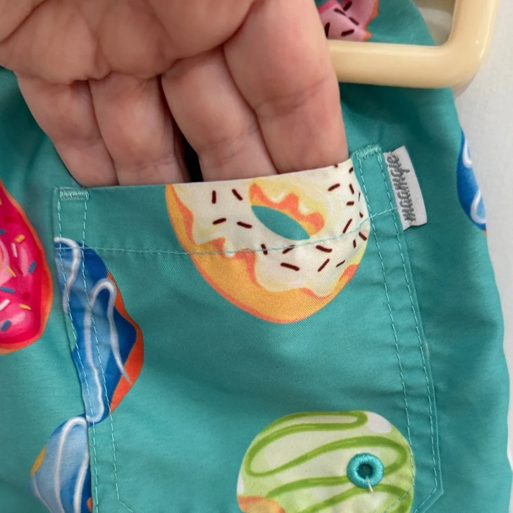 Vibrant Teal Kids Swim Trunks with Donut Design